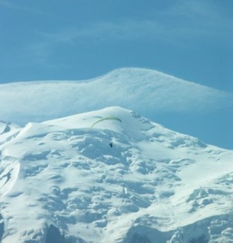 paragliders passing Mont Blanc